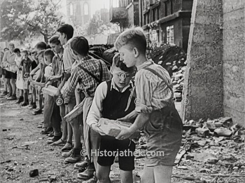 Children clearing rubble 1945